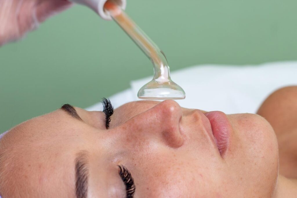 using high frequency wand to acne skin